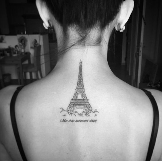 Eiffel Tower tattoo on girl's back