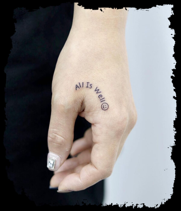 Curved-Phrase-Hand-Tattoo