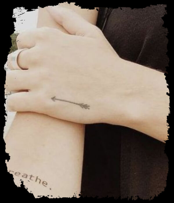 Small-Arrow-Hand-Tattoo