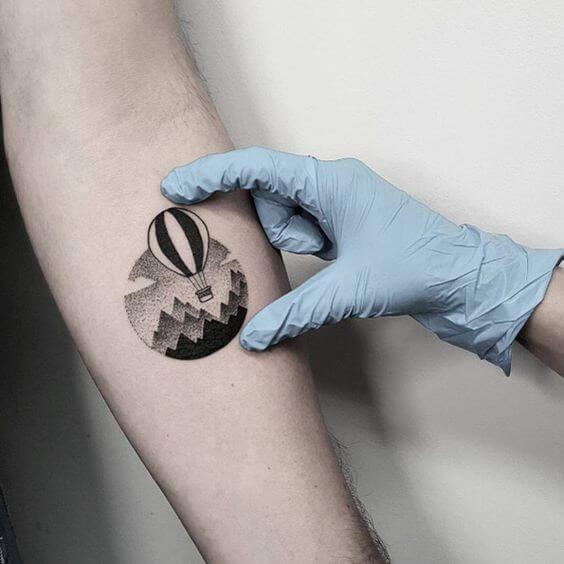 Tattoo ideas, Minimal Sunflower Tattoo on Woman's Arm
