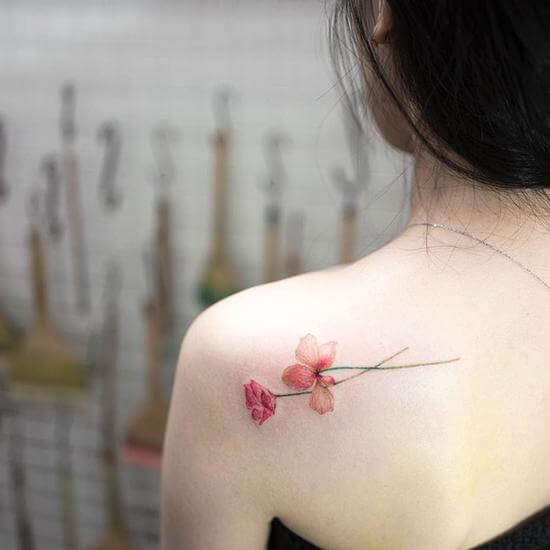 Delicate minimal flowers tattoo - Tattoogrid.net