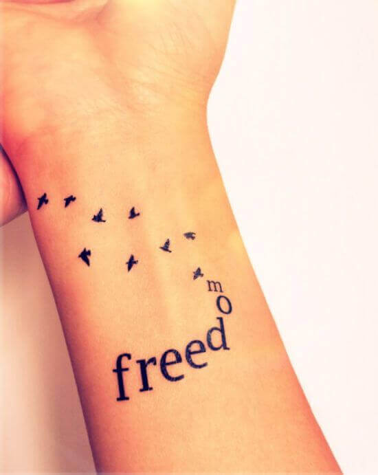 Bird With _FREEDOM_ Small Tattoo