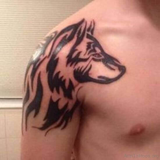 Modern Tribal Wolf Back Of Shoulder Male Tattoo  Tribal wolf tattoo Wolf  tattoos Upper arm tattoos for guys
