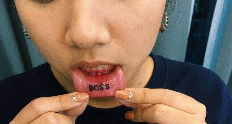 Woman left in tears as tattoo fail leaves her with strange phrase on her  outer lip  Mirror Online