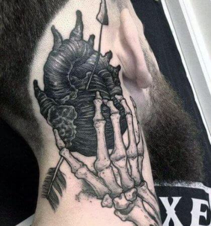 50 Incredible Skeleton Hand Tattoo Designs with Meaning 2024