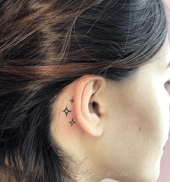 Faded dotwork style behind the ear moon and stars tattoo art deco stars  delicate  Behind ear tattoos Star tattoos Planet tattoos