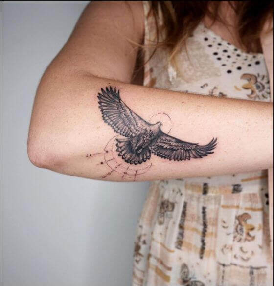 Tattoo of a traditional eagle located on the forearm