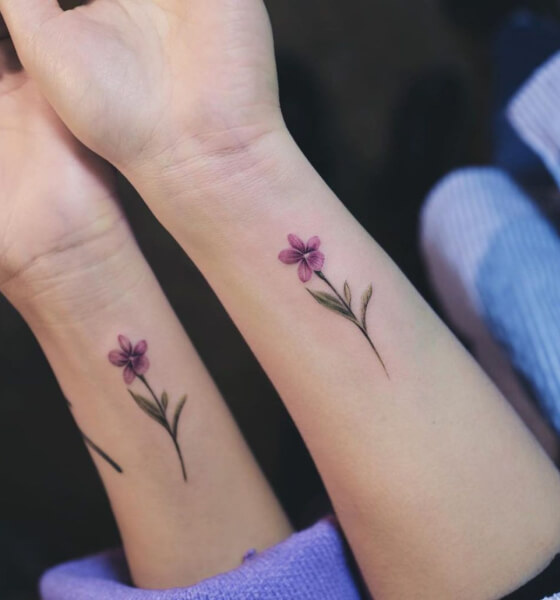 Matching flowers tattoo for best friends