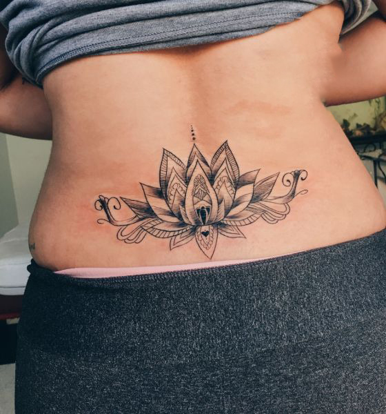 Tattoo of Lotus lower back Perfect balance tattoo  custom tattoo designs  on TattooTribescom