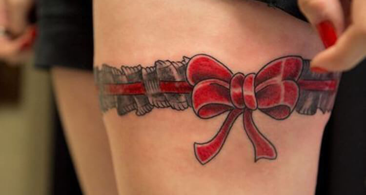 Gun Thigh Garter Tattoo by 88InkBlood Tattoo Studio