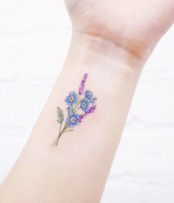 15 floral designs like is Larkspur tattoo for July birth celebrations