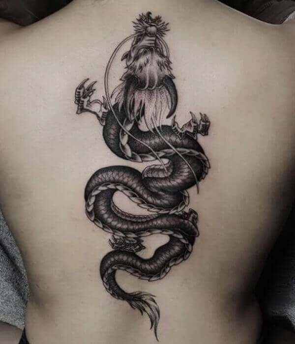 Dragon down the spine tattoo machinetattoo dragontattoo cherryblossoms  spinetattoo backtattoo  Instagram
