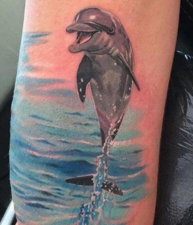 30+ Amazing Dolphin Tattoo Ideas And Designs with Meaning