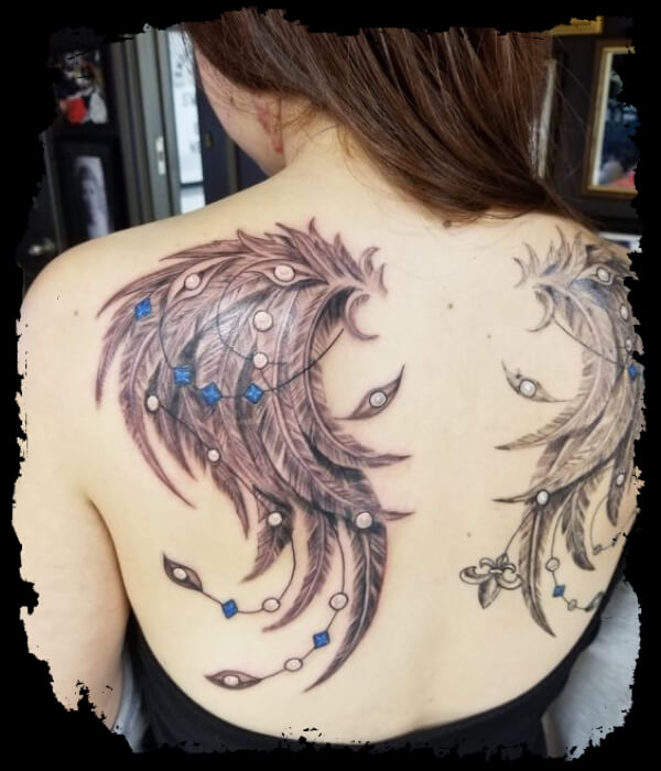 wings-tattoo-on-back-women 