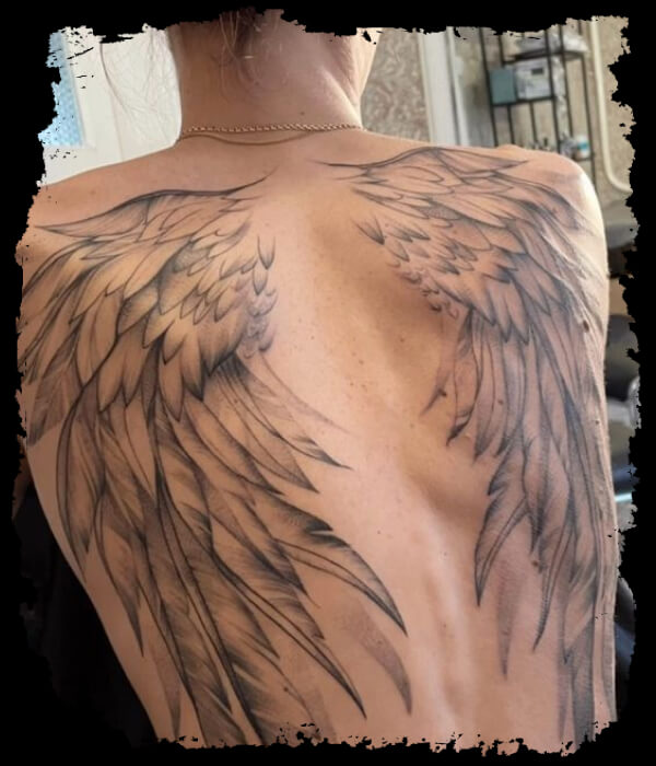 wings-tattoo-on-back-women 