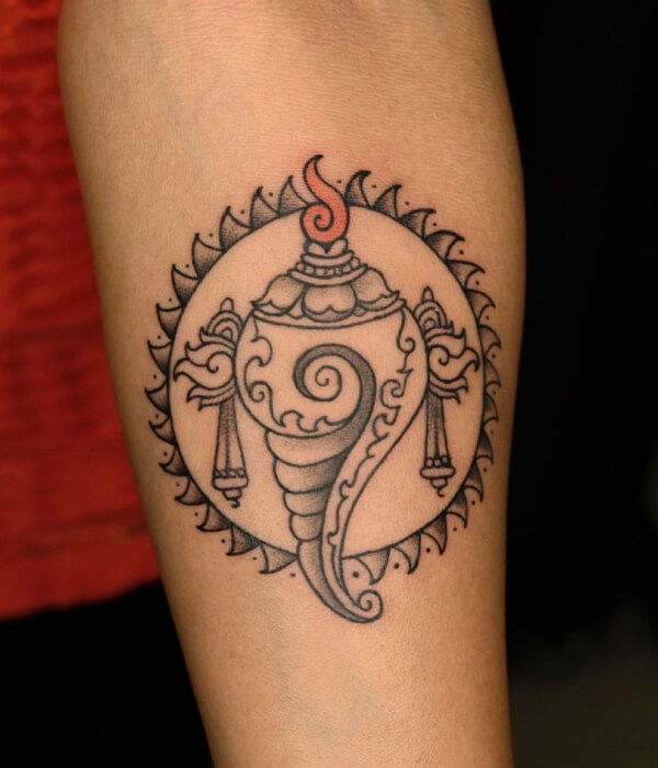 Krishna's-Chakra-and-Conch-Tattoo