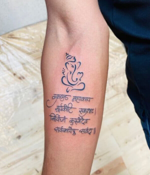 Ganesh-with-Sanskrit-Script-Tattoo