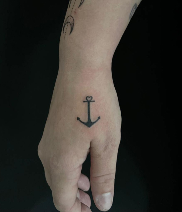 Anchor Hand Black and White Tattoo