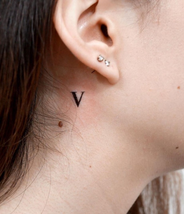 Small-Letter-V-Tattoo-Behind-Ear