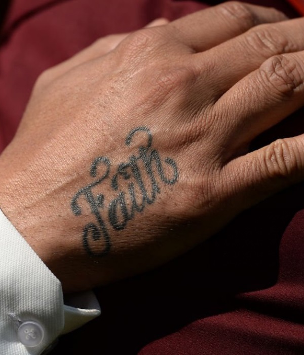 Harbhajan-Singhs-Hand-Faith-Tattoo