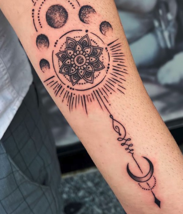 Polynesian-Sun-and-Moon-Forearm-Tattoo