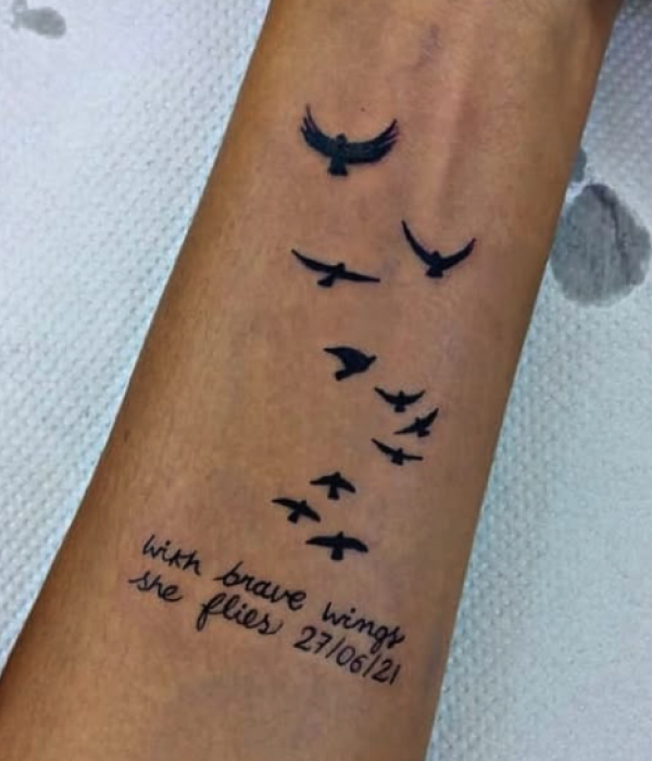 With-brave-wings,-she-flies-Verse-Tattoo