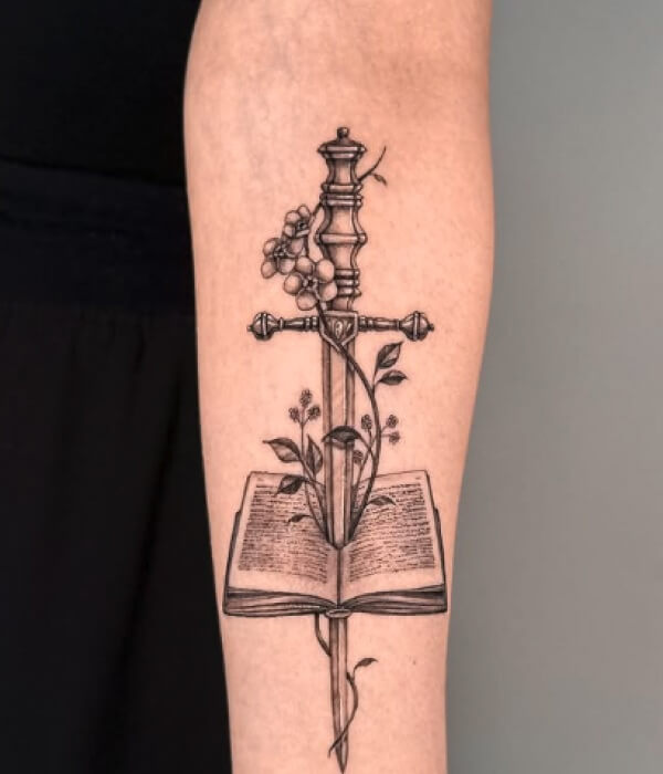 Book Tattoo with Flowers and a Sword